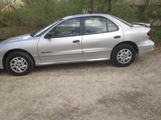 Driving Successful Lives Hands off Newly Donated Pontiac Sunfire to Iowa Woman Needing Transportation for Work