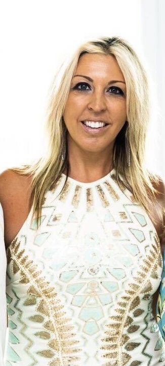 Stephanie Cirami receives the White Blazer Award for Hope, Peace, Love, Unity and Change