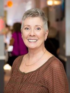 Rev. Jenna Arnaz selected as Empowered Woman of the Year by IAOTP